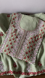 Folded kurta piece and dupatta, chikankari along the hem