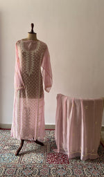 Pink pure mul chanderi chikankari suit set on the mannequin with its dupatta
