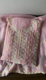 Folded kurta piece and dupatta, chikankari in white thread along the hem