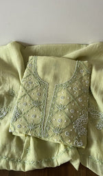 Folded kurta piece and dupatta, chikankari in white thread along the hem