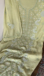 Sleeve work in white thread on green pure mul chanderi