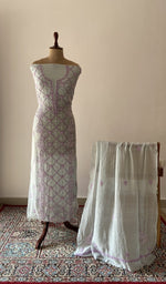 Blue pure mul chanderi chikankari suit set on the mannequin with its dupatta
