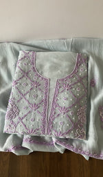 Folded kurta piece and dupatta, chikankari along the hem