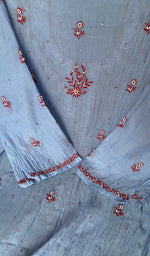 Hem and border of the blue dupatta