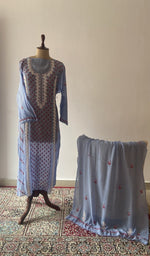 Blue pure mul chanderi chikankari suit set on the mannequin with its dupatta