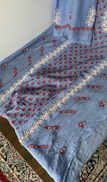 Front panel worked in red thread with beads, sequins and cutdana