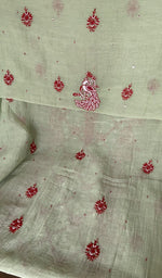 Hem and border of the green dupatta