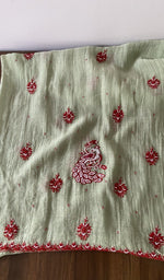 Folded stack, green pure mul chanderi