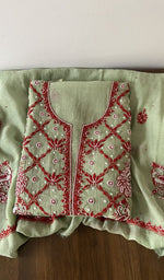 Folded kurta piece and dupatta, chikankari in red thread along the hem