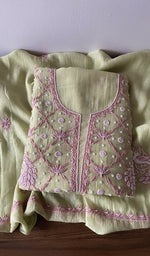 Folded kurta piece and dupatta, chikankari in pink thread along the hem