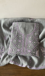 Folded grey pure mul chanderi kurta piece with chikankari on the panel