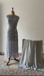 Grey pure mul chanderi chikankari suit set on the mannequin with its dupatta