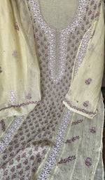 Sleeve work in lilac thread on yellow pure mul chanderi