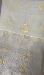 Hem and border of the green dupatta