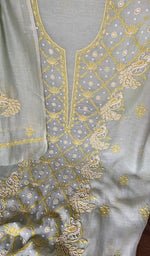 Sleeve work in gold thread on green pure mul chanderi