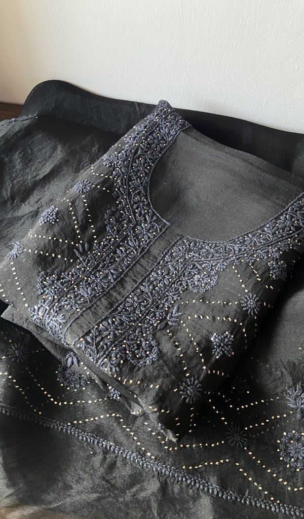 Black pure organza silk kurta piece folded, fine front jaal chikankari