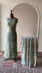 Steel blue mul chanderi set on the mannequin with its dupatta