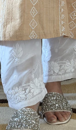 Chikankari at the hem of the white muslin pant, close up