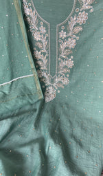 Sleeve work on green pure mul chanderi