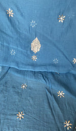 Hem and border of the blue dupatta