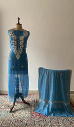 Blue pure mul chanderi chikankari suit set on the mannequin with its dupatta