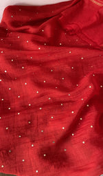 Hem and border of the red dupatta