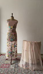 The set on the mannequin with its dupatta beside it