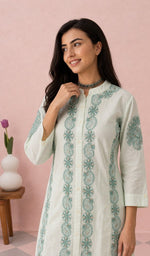 White kurti upper body with the neckline chikankari