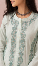 White kurti, neckline and yoke embroidery up close