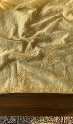 Hand embroidery on lemon yellow mul chanderi