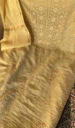 Fine chikankari on gala and boota on the lemon yellow mul chanderi