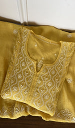Folded mustard yellow mul chanderi kurta, second view