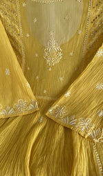 Close view of the mustard yellow kurta fabric
