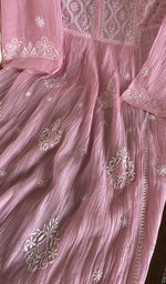 Fine chikankari with haath ki jaali on semi-stitched on the baby pink mul chanderi