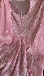 Baby pink mul chanderi laid flat on the table