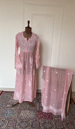 Baby pink mul chanderi set on the mannequin with its dupatta