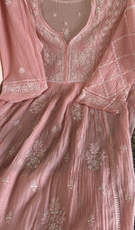 Baby pink mul chanderi laid flat on the table