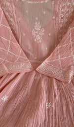 Close view of the baby pink kurta fabric