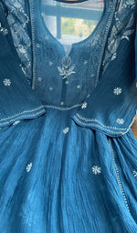 Close view of the peacock blue kurta fabric