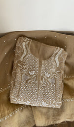 Second folded view of the beige kurta piece
