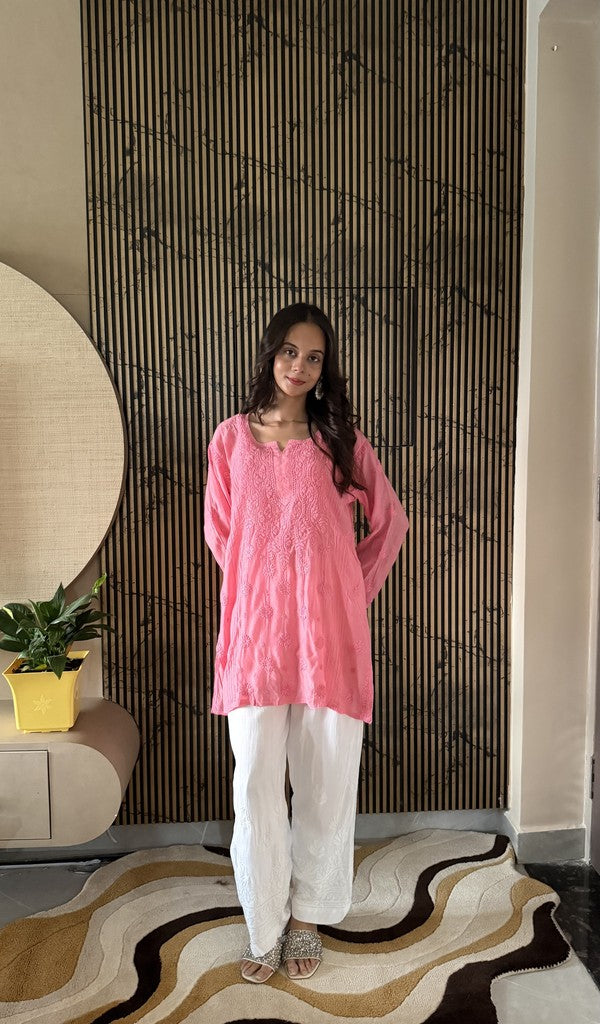 Pink muslin short kurti on the model