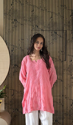 Pink short kurti on the model