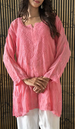 Pink short kurti, worn by the model