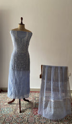The set on the mannequin with its dupatta beside it