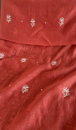 Close view of the brick red kurta fabric