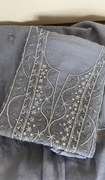 Grey pure mul chanderi kurta piece folded, fine chikankari on the panel, along with beads