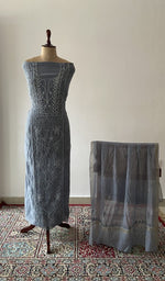 The set on the mannequin with its dupatta beside it