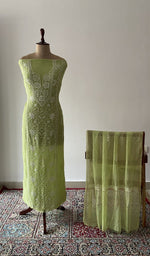 The set on the mannequin with its dupatta beside it