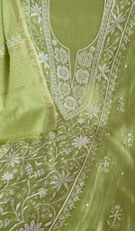 Motifs across the body of the leaf green kurta