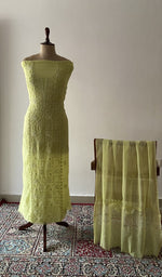 The set on the mannequin with its dupatta beside it